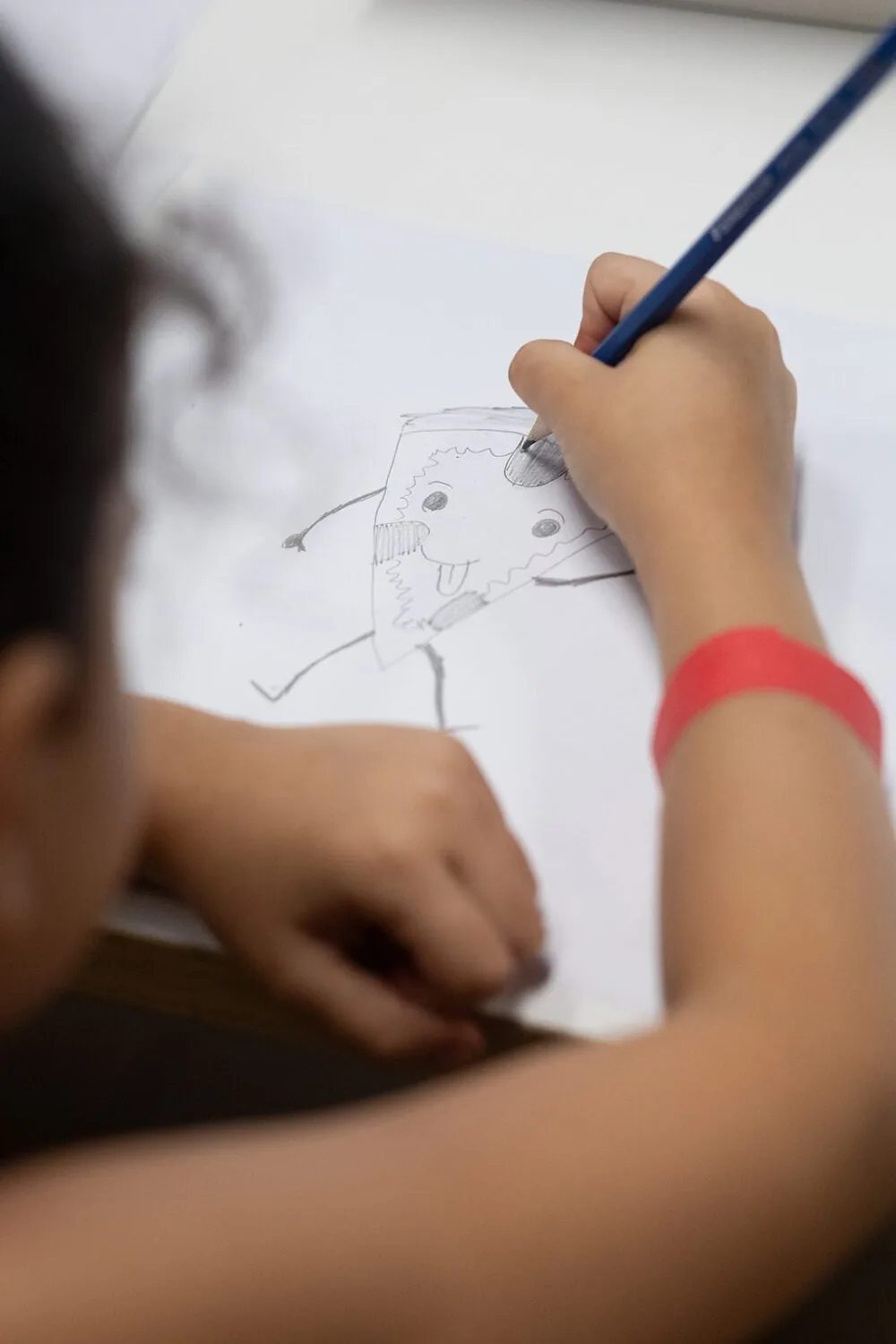 Children drawing at the museum stations